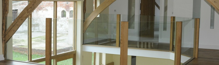 Oak & glass balcony in barn conversion
