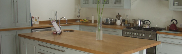 Painted shaker style kitchen with solid Oak worktops